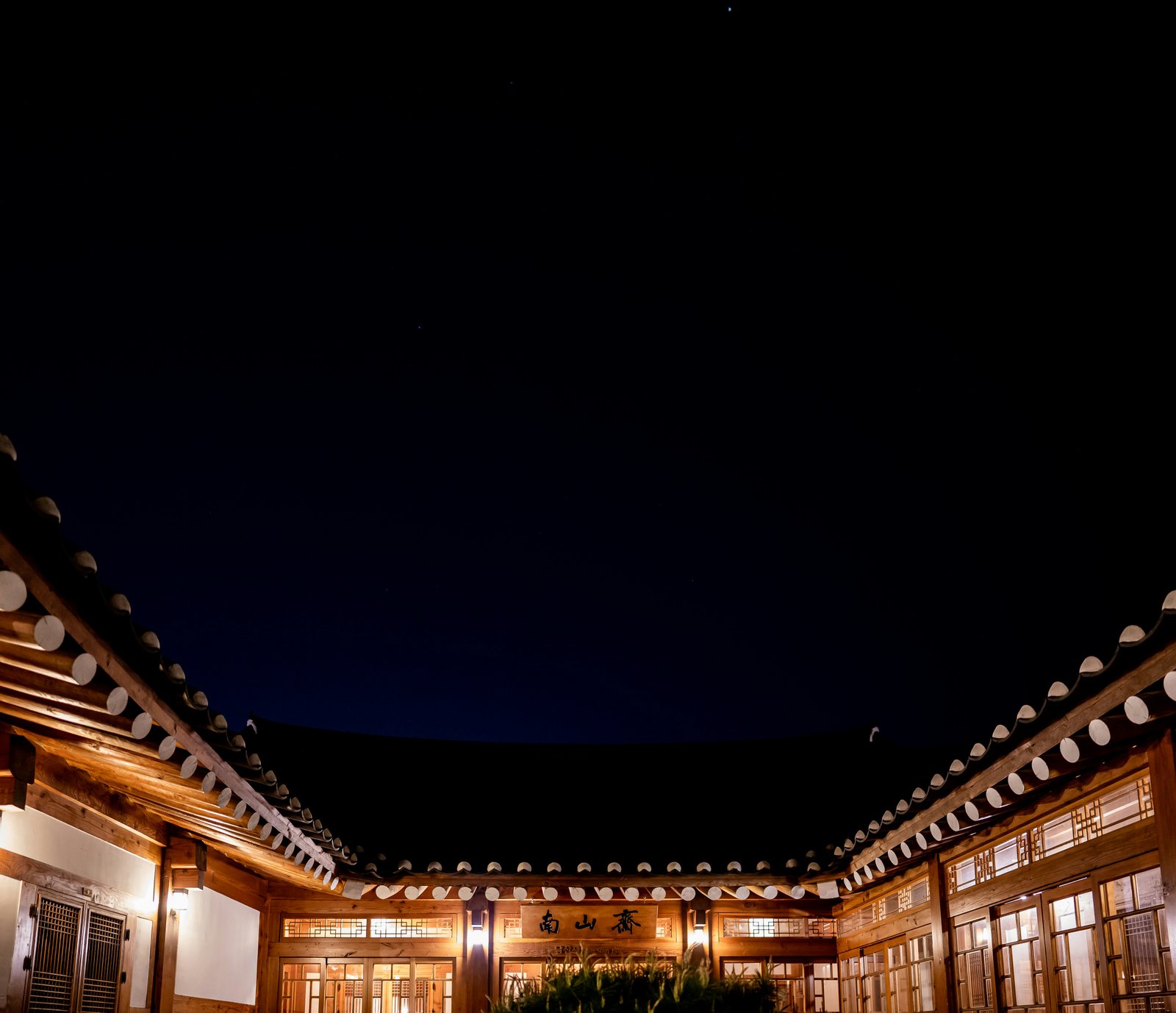 brown and white concrete building during night time